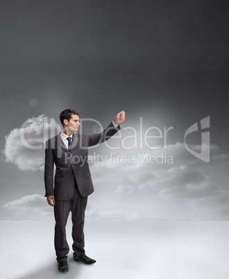 Businessman holding out his arm