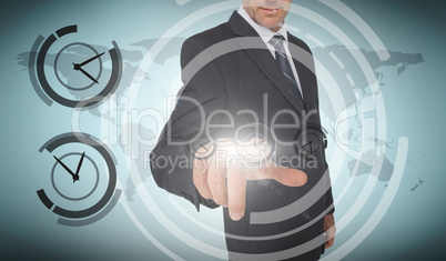 Businessman selecting a screen with dials around him