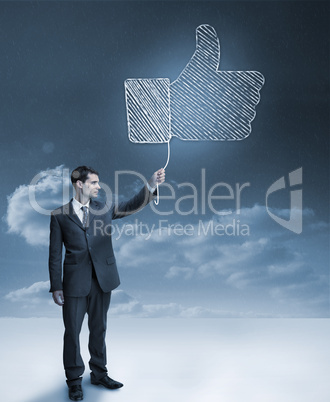 Businessman holding a blue giant thumb up