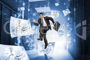 Businessman jumping in a corridor with drawings around