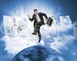 Businessman jumping over a planet with drawings floating