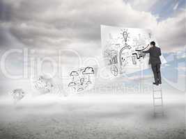 Businessman on a ladder drawing on a floating paper