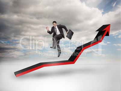 Businessman jumping over a red arrow pointing up