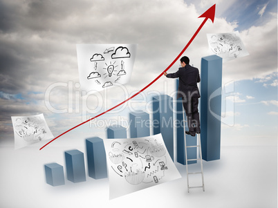 Businessman drawing a red arrow over a chart