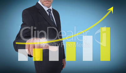 Businessman touching a chart with an arrow pointing up