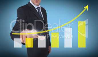 Businessman touching a chart with an arrow pointing up