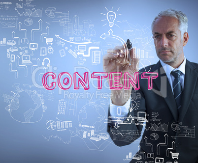 Businessman holding a marker and writing the word content