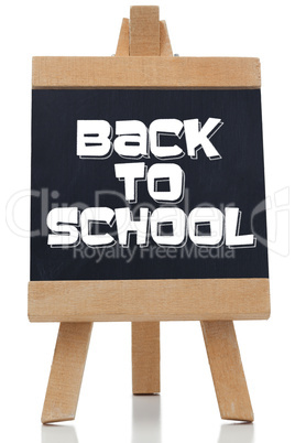 Back to school written in white on chalkboard