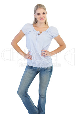 Blonde woman with hands on her hips