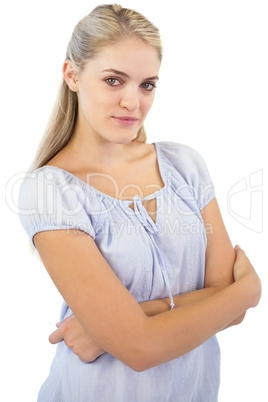 Blonde woman with crossed arms