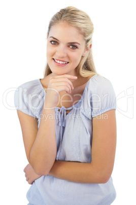 Cheerful blonde woman looking at camera