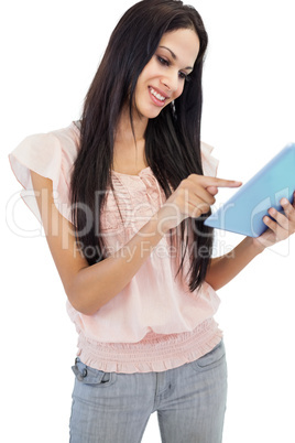 Cheerful brunette using tablet pc