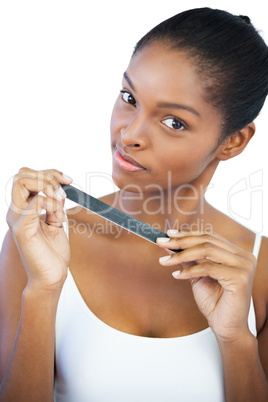 Brunette holding her nail file