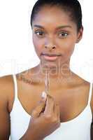 Woman holding her tweezers