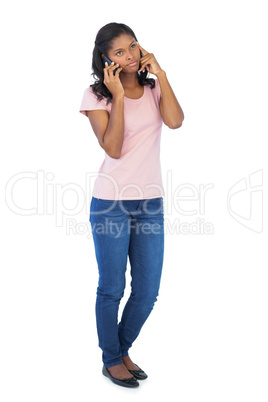 Serious woman calling with her mobile phone