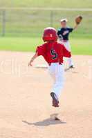 Baseball player running to second base