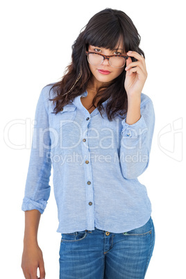 Serious young woman wearing glasses