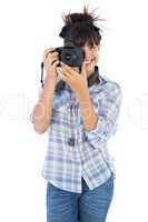 Young woman taking picture with her camera