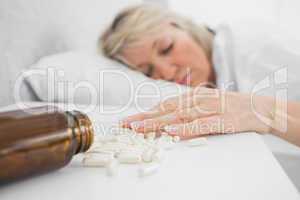 Blonde woman lying motionless after overdosing