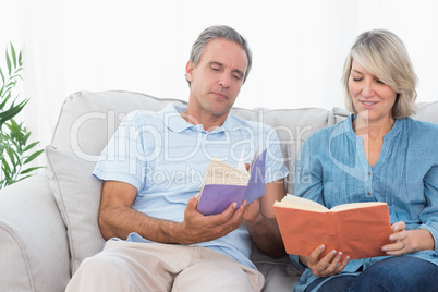 Couple talking about their books