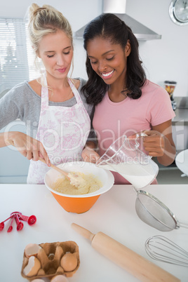Pretty friends making pastry together