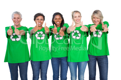 Team of female environmental activists giving thumbs up