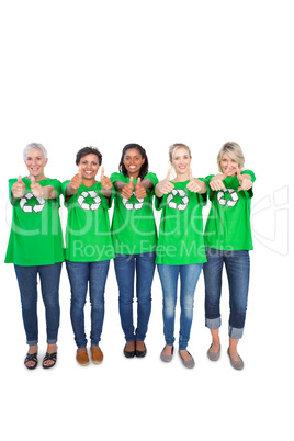 Team of happy female environmental activists giving thumbs up