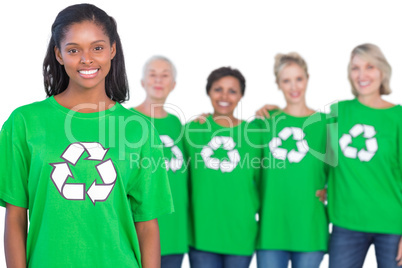 Team of female environmental activists smiling at camera