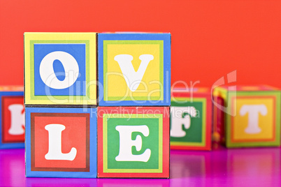 word "love" made from baby blocks