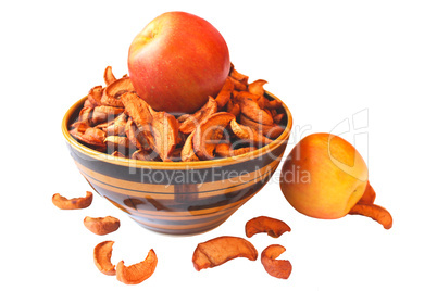 dried pieces and fresh apples in the plate