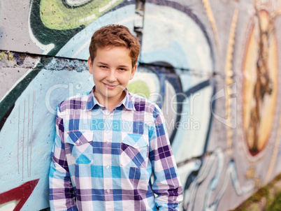 Portrait of the teenager boy in outdoors Portrait of the teenager boy in outdoors