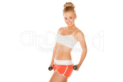 woman working out with dumbbells