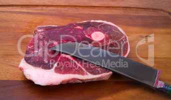 raw meat with national uzbek knife
