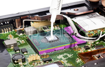 Thermal compound in syringe and laptop video chip