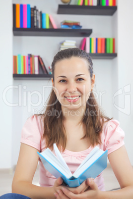 young attractive lady with a book