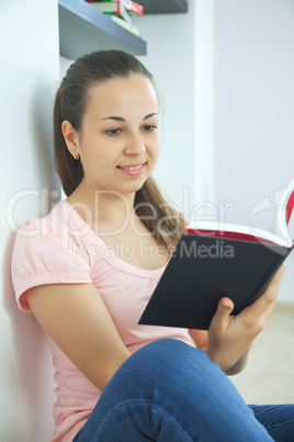 young attractive lady with a book