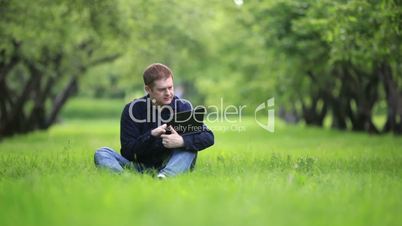 Businessman working in the park.