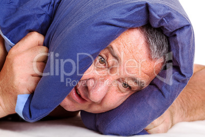 Man lying in bed and can not sleep
