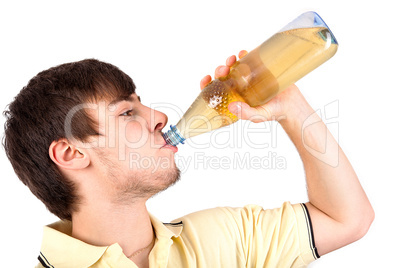 Young man drinking from a bottle