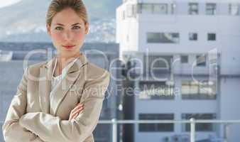 Businesswoman with arms folded in her office