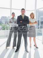 Portrait of confident business people standing together