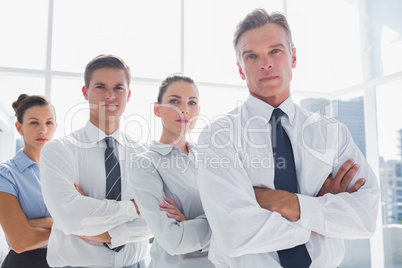 Business people standing together in line