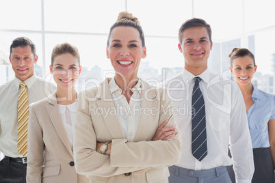 Group of smiling business team standing together