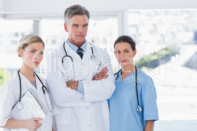 Three serious doctors