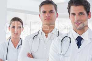 Three doctors with lab coats