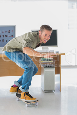 Creative business employee skating through the office