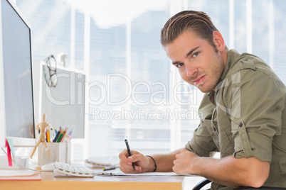 Handsome creative business employee working