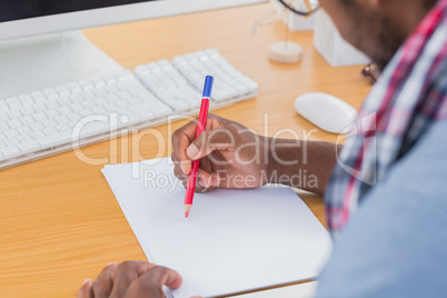 Creative business worker drawing something