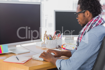 Calm business worker on computer