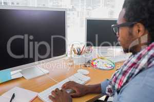 Business worker with reading glasses on computer